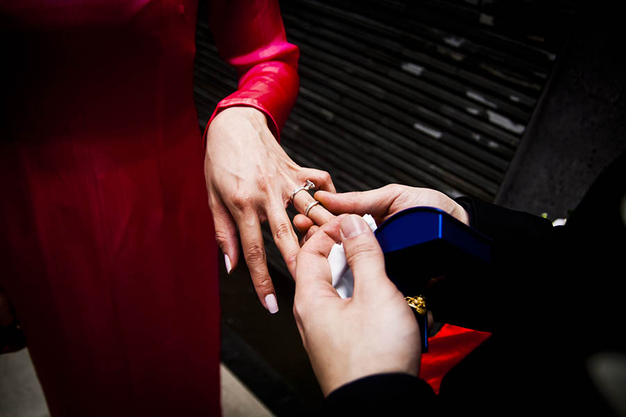 Danang City Wedding - groom putting ring on bride's finger