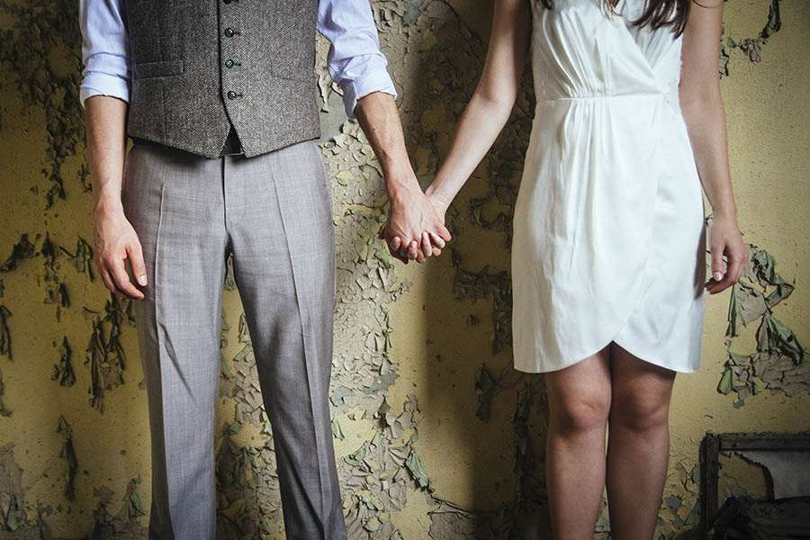 Ballhaus Gruenau couple shoot - Formally-dressed couple holding hands