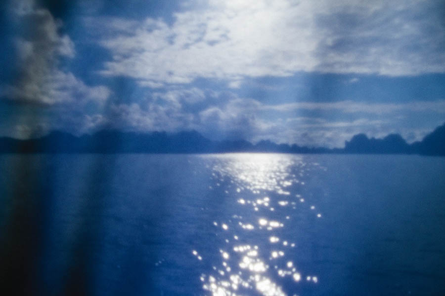 Halong Bay seen through blue fabric