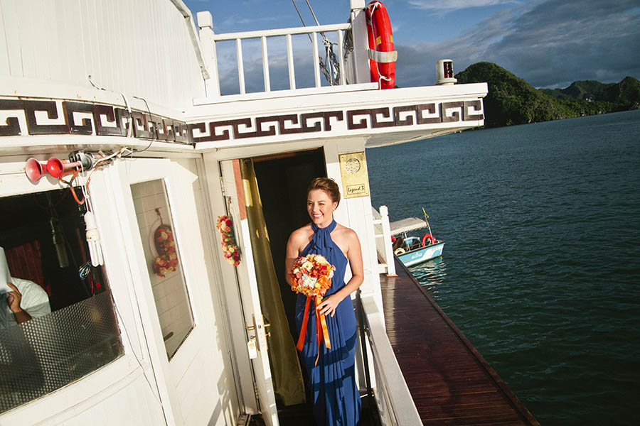 Private boat wedding - Bride on boat coming to her wedding ceremony