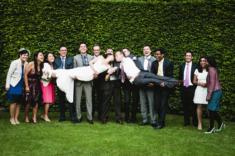 Oud Turnhout Belgium Wedding - Wedding party lift newlyweds