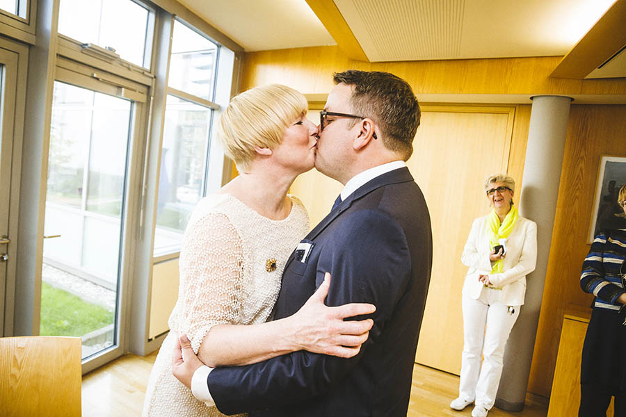 Nordic Embassy wedding - Newlyweds kiss after being married